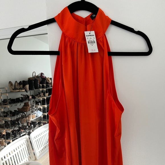 EXPRESS. MED. Orange. NEVER WORN. 21 inches wide pit to pit. 15 inches length. - Picture 1 of 3